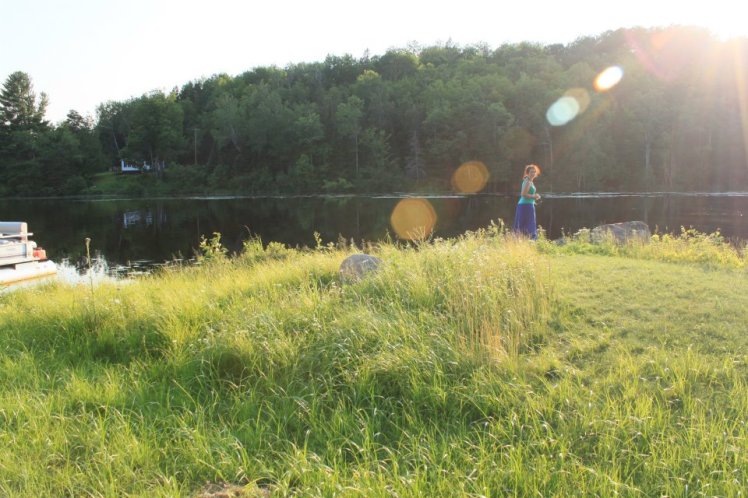 Amy enjoying sunshine on the Paint River in Crystal Falls. 