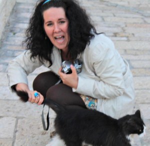 Amy in Jerusalem, Israel  in spring of 2011 making a new furry friend. Photo by: Heather Hollands