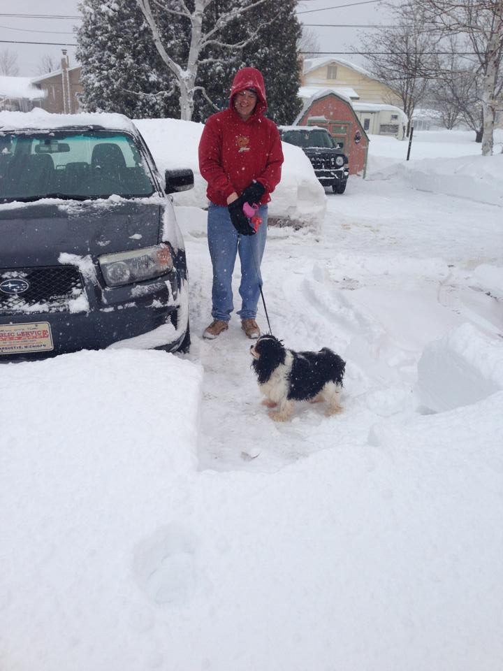 Mike takes a break from snow plowing with his best friend, Phoebe. He just finished telling me that if I had a Subaru (like he does) instead of a Jeep that there would be no need for snow blowing our drive. ;) 