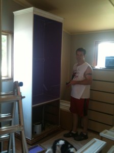 Mike converting entertainment centers into a standing wardrobe. They now have doors. I promise to post an update when the project is finished. 