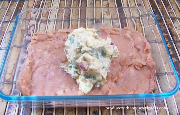 Top the beans with a 1/2 cup of guacamole.