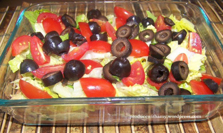 Sprinkle the dip with black olives.