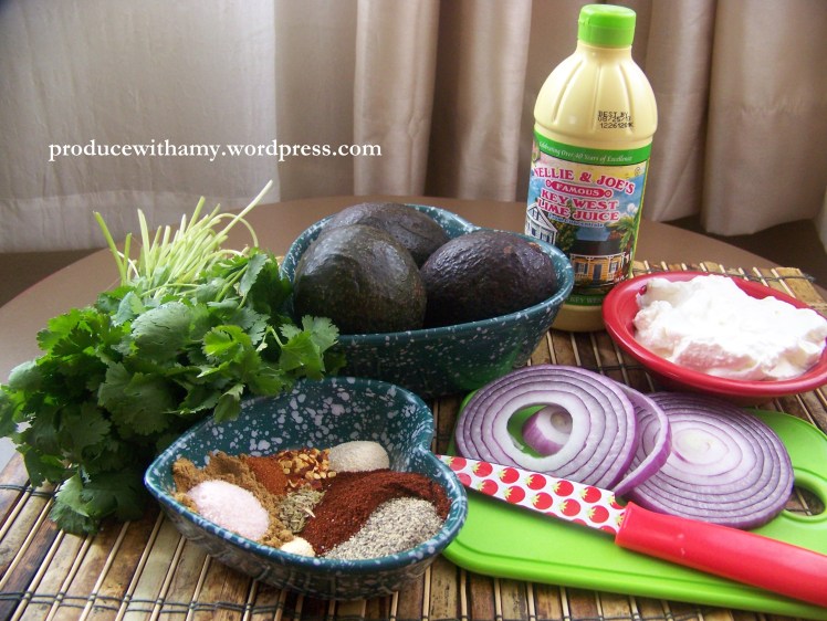 Ingredients for the guacamole: fresh cilantro, three avocados, lime juice, taco seasoning, red onion, and sour cream (I use Vegan soy-based sour cream). If you eat dairy you could also use plain Greek yogurt.