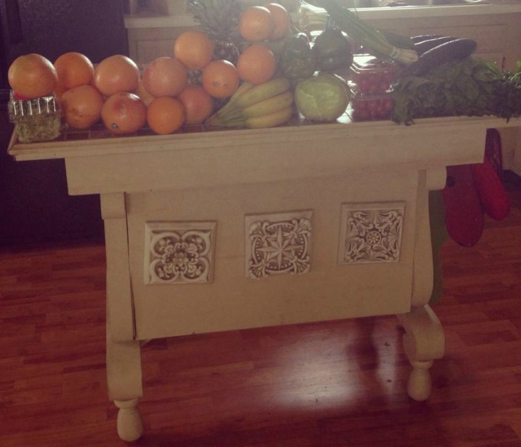 A sampling of yesterday's produce on the kitchen island and my husband upcycled from an old table. 