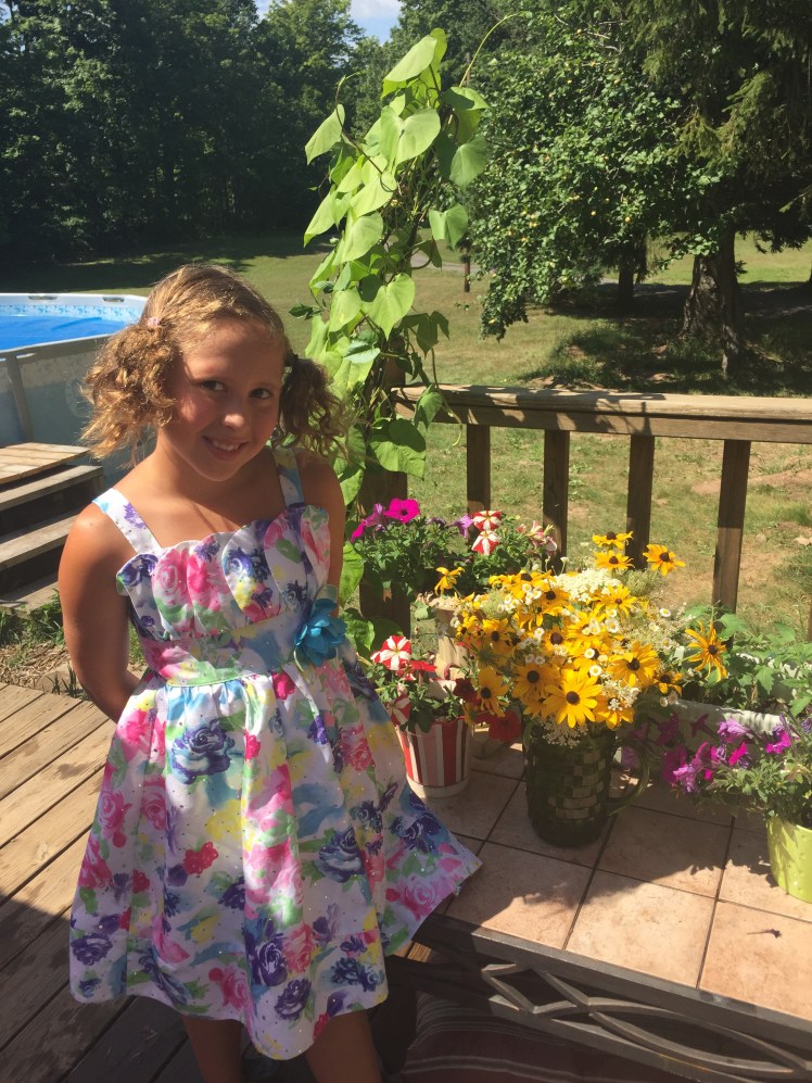 Avalon curled her hair for the photo shoot and I told her it looked a little "crazy" but she insisted on wearing it this way. I love that she knows what she likes and has a strong sense of her own style. I think she will grow up to be a determined and creative young woman. I am so proud of her!