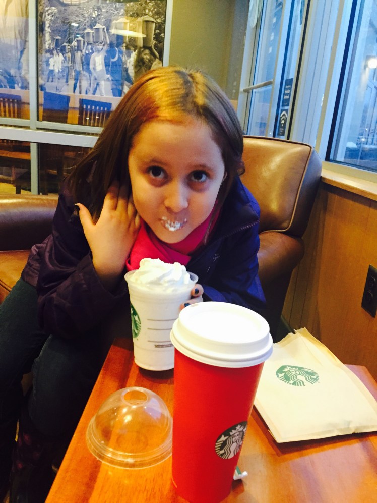 Miss Avalon enjoying her Starbucks treat. 