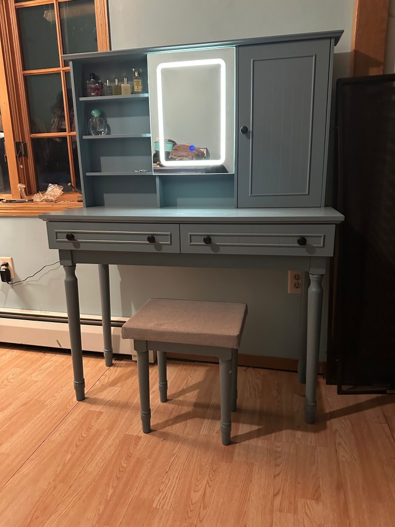 This photo is a bit dark, the color is beautiful. It's a light blue. 